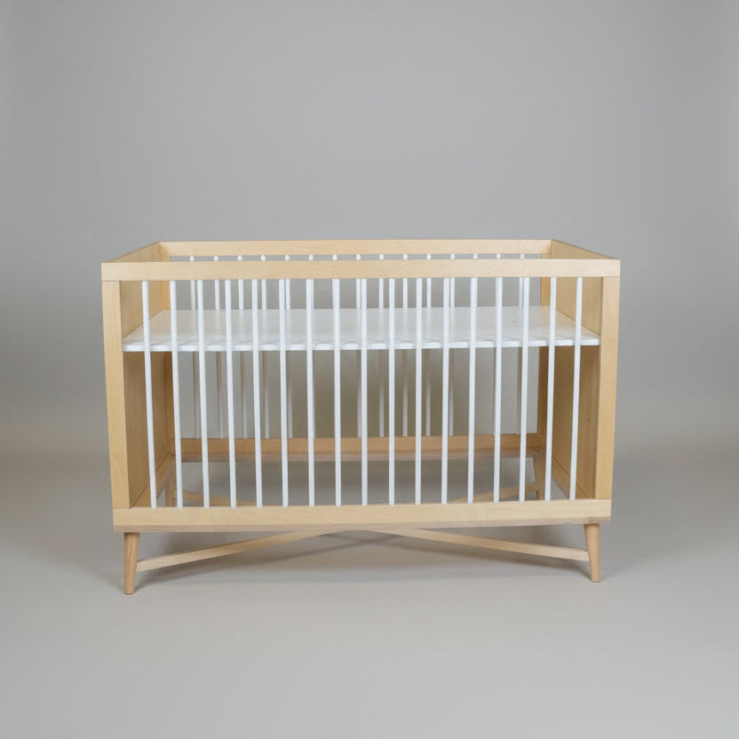 Heidi cot side view in wood