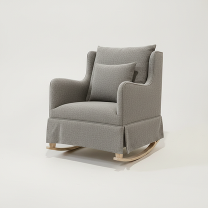 Gray upholstered rocking chair on a white background