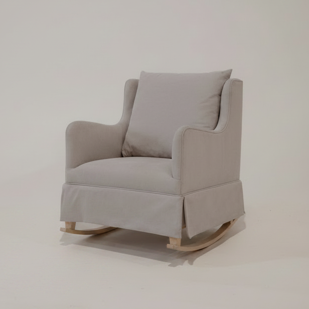 Gray armchair with matching ottoman on a white background