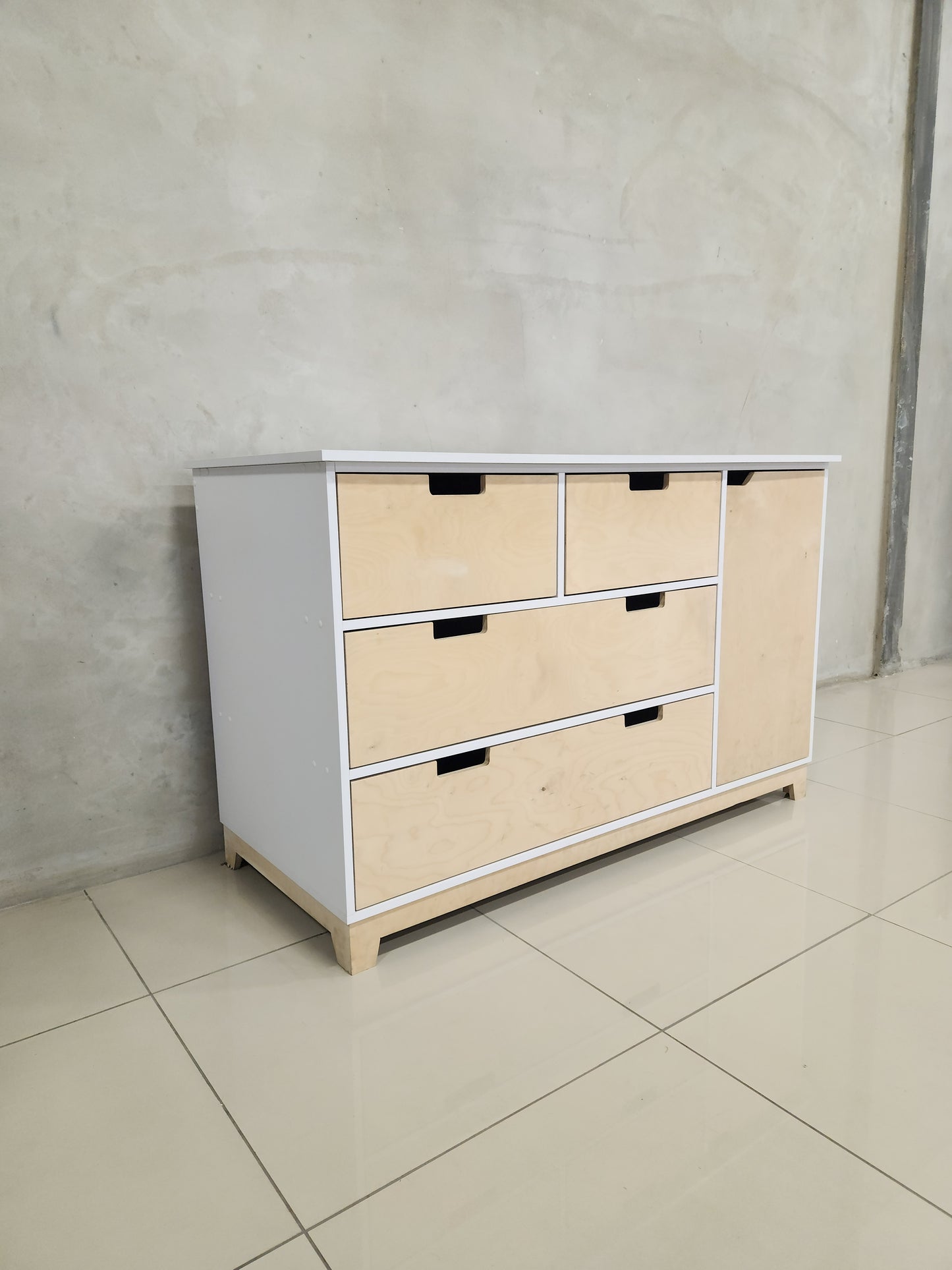 Stylish Rupert Compactum featuring birch wood and melamine, perfect for nursery storage.