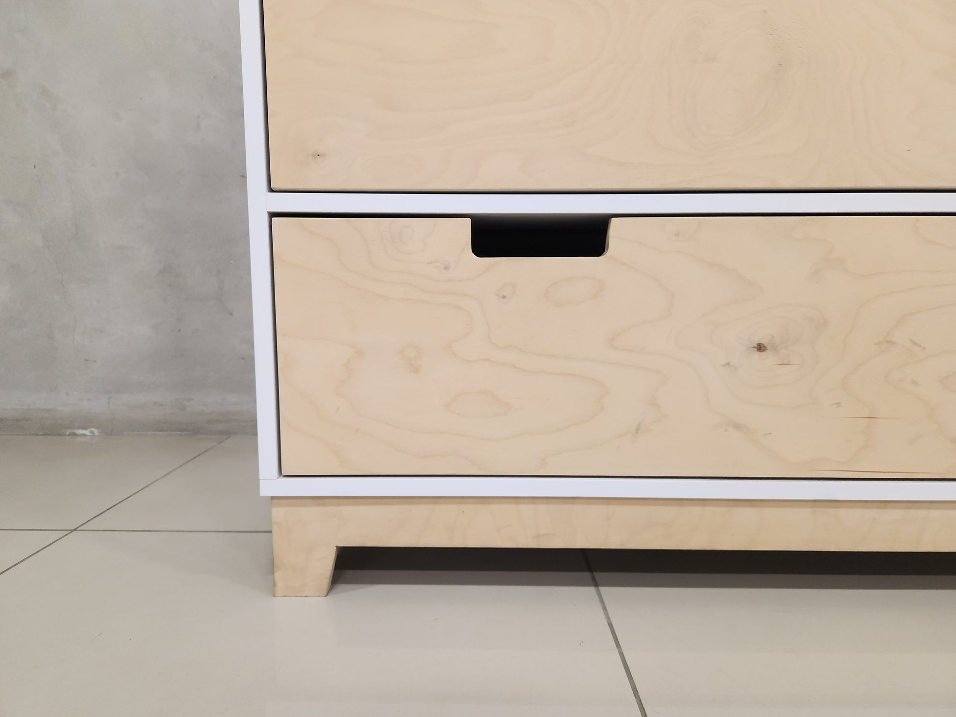 Side view of the Rupert Compactum showcasing its birch wood and melamine construction with ample storage space.