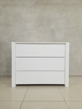 Best-selling Square Frame Compactum in all-white with spacious drawers for nursery organization.