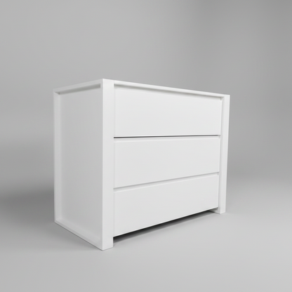 White three-drawer compactumc on a gray background