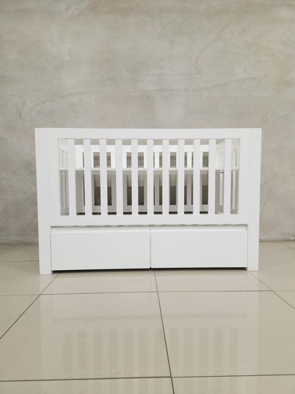 Square Frame Cot with convertible toddler bed option and spacious storage drawers for baby essentials.