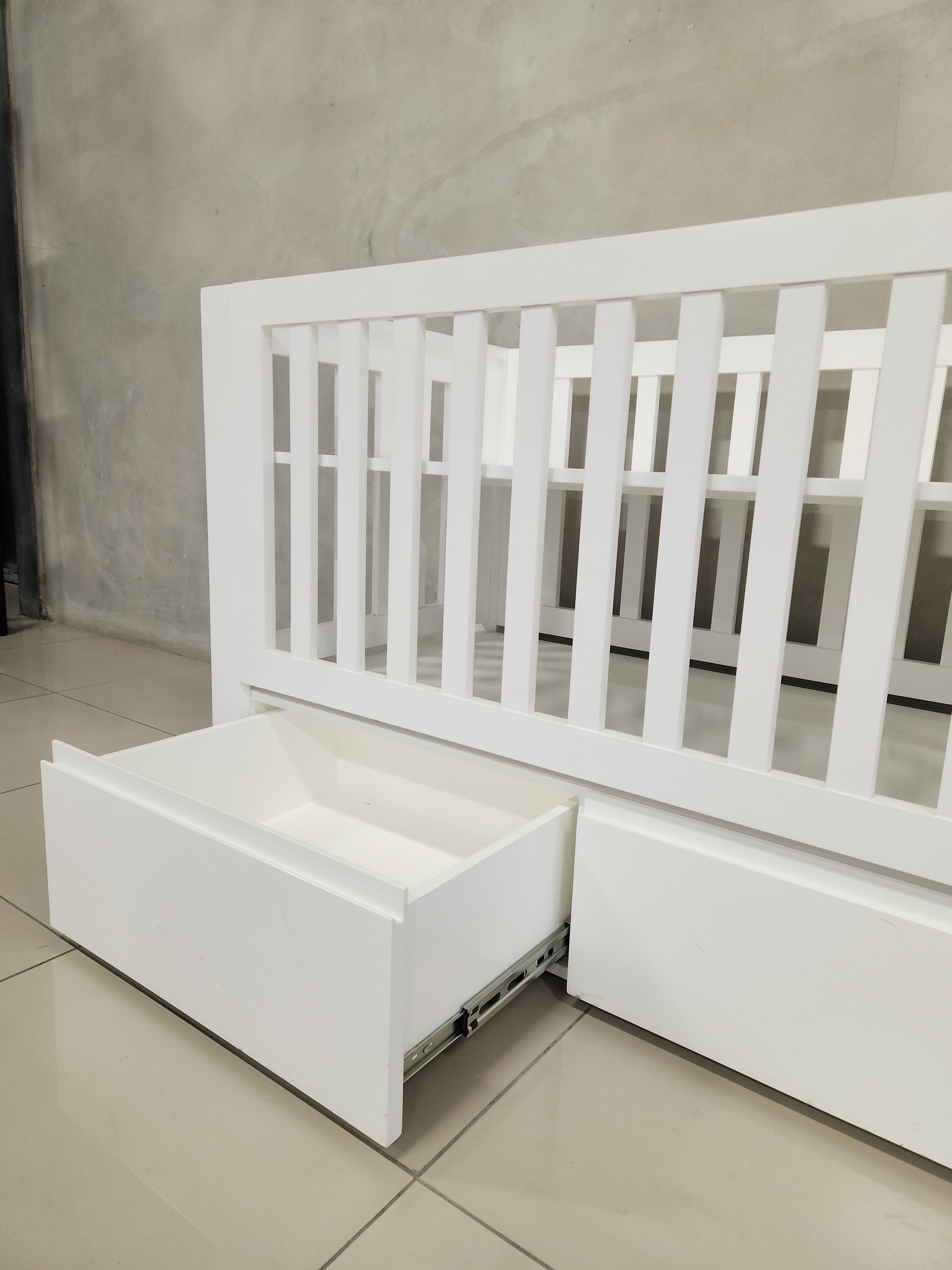 Convertible Square White Frame Cot with sleek design and extra storage, ideal for nurseries.