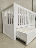 Convertible Square White Frame Cot with storage drawers, perfect for growing babies.