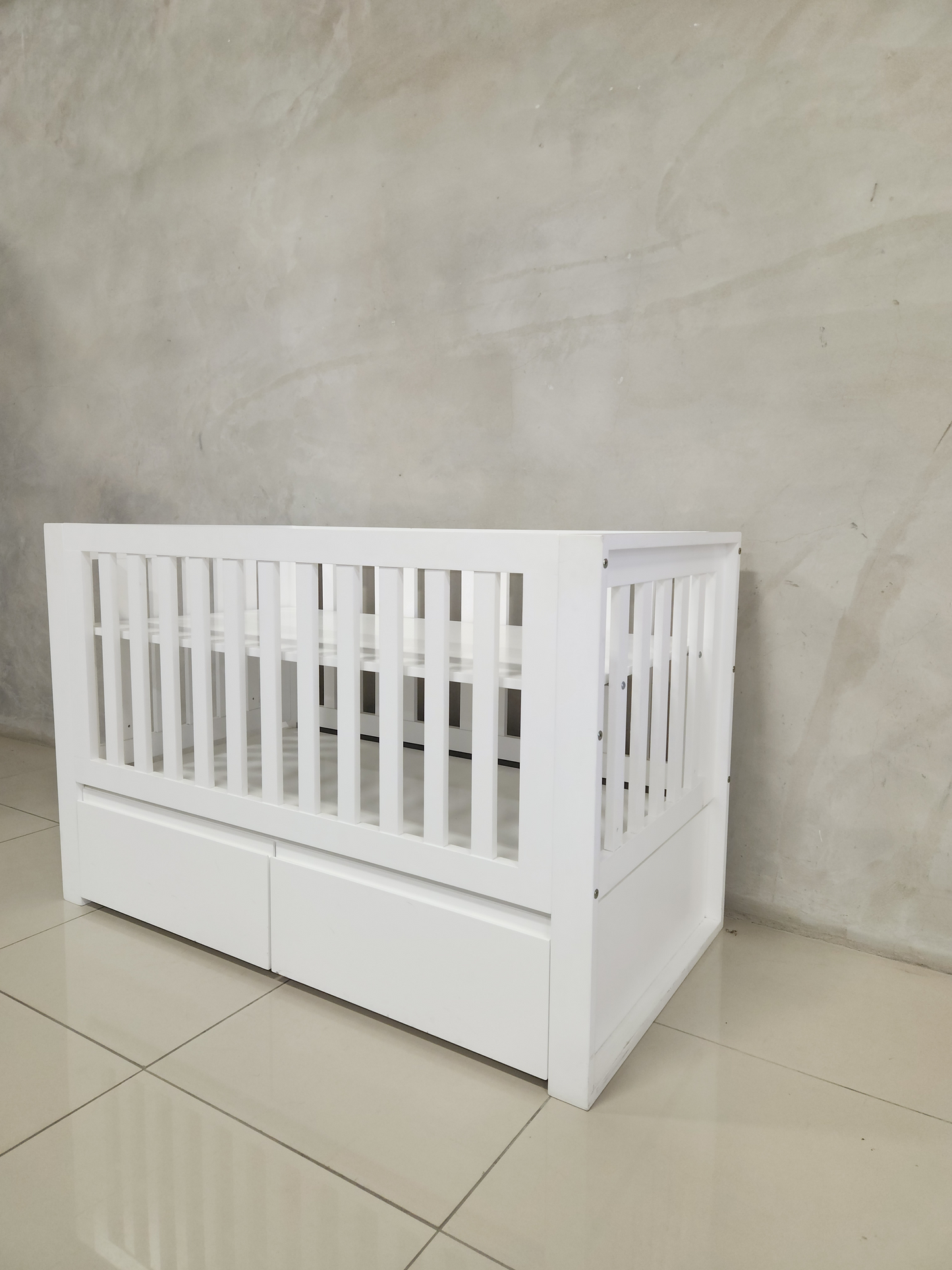 Modern Square White Frame Cot, offering toddler bed conversion and additional storage space.