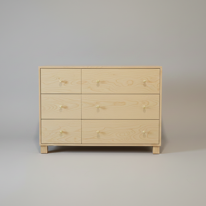 Wooden dresser with six drawers on a plain background