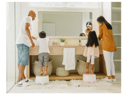 Toddler using Bumbo® Step 'n Potty as a toilet trainer.