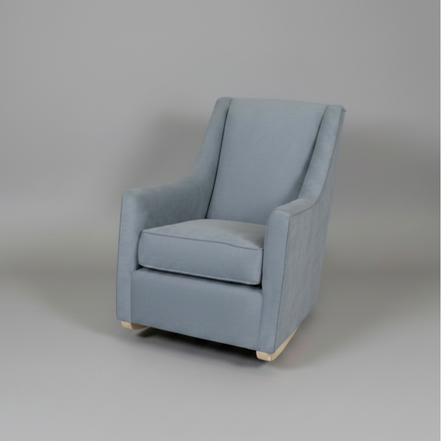 Blue armchair on a gray background