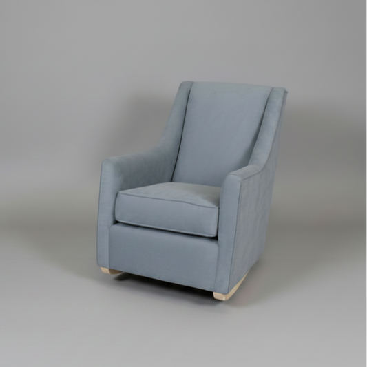 Blue armchair on a gray background
