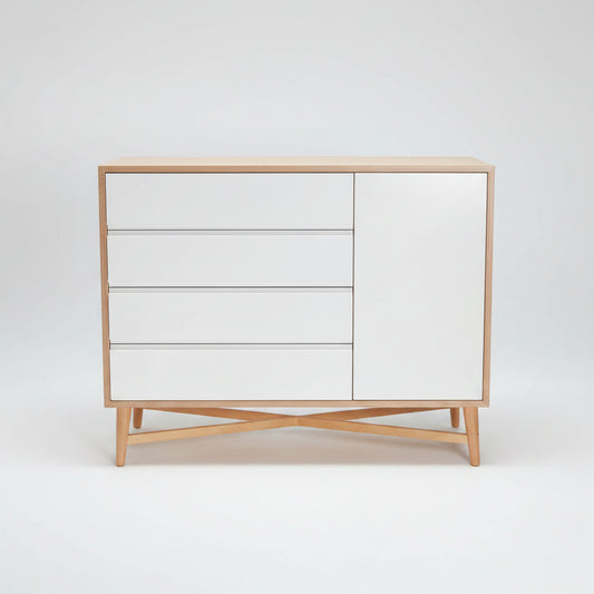 Heidi Compactum crafted from birch wood and MDF, with spacious storage and cross-leg detailing.