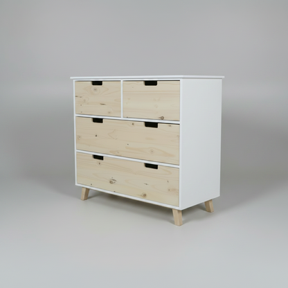 White nursery compactum w with light wood drawers on a gray backgound