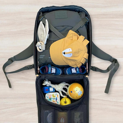 MiniMeis Backpack on a hiking trail, highlighting water-resistant design and storage.