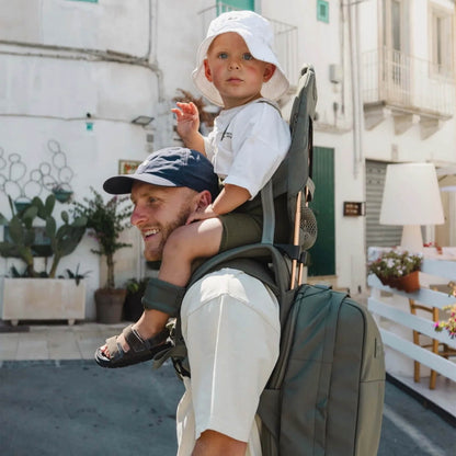 Close-up of MiniMeis Backpack compartments packed with baby essentials