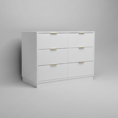 White dresser with gold handles on a gray background