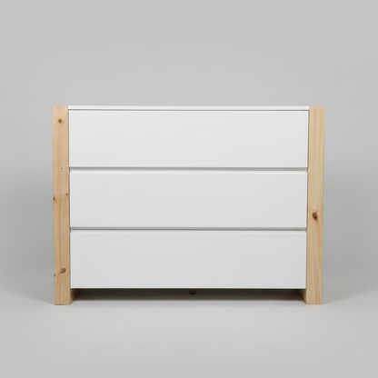 White dresser with wooden frame on a gray background