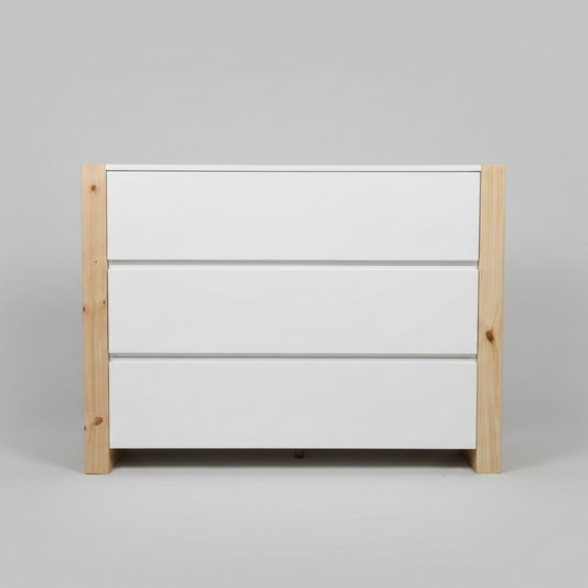 White dresser with wooden frame on a gray background