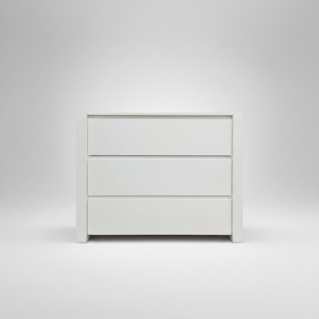 White dresser with three drawers on a light gray background